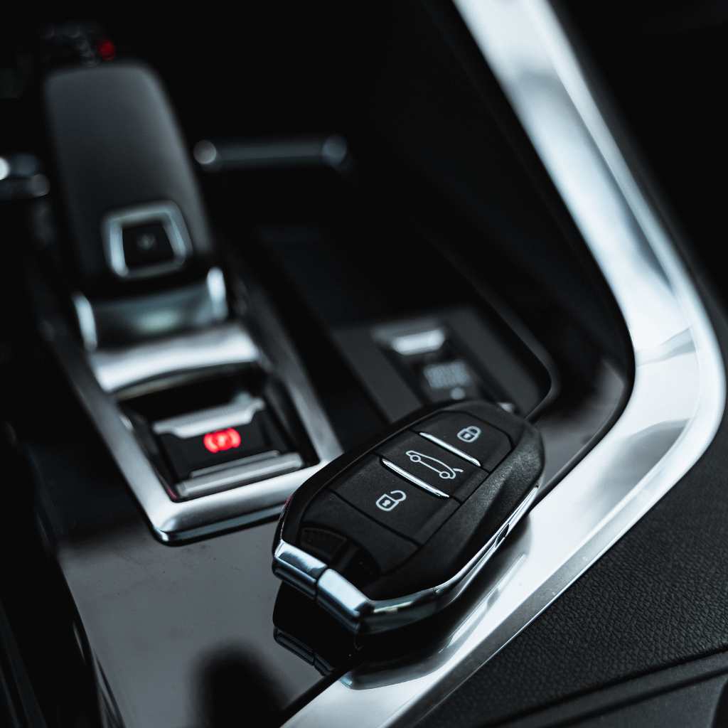 Certified key fob programming specialists using factory-level diagnostic tools to program smart keys and keyless entry systems for all vehicle makes